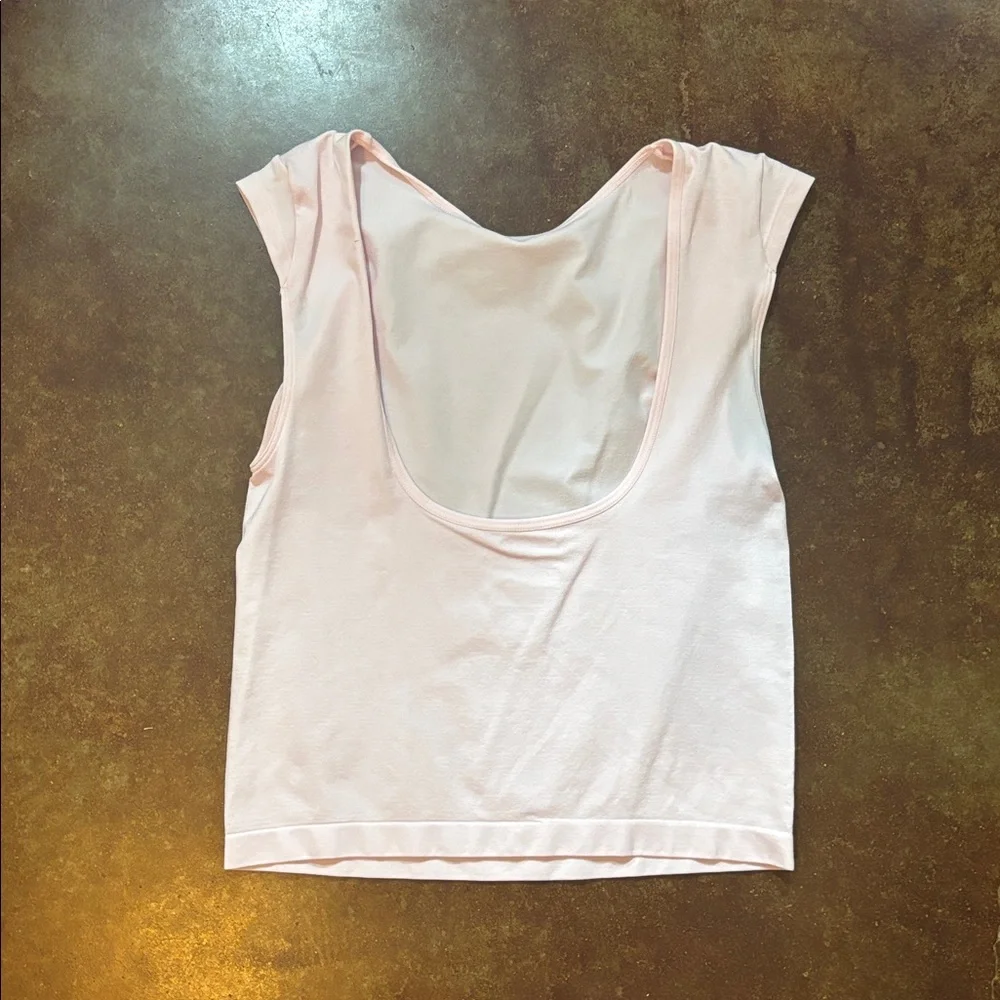 Women's light pink backless top size small never worn